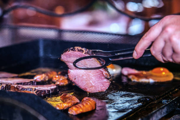 istock The chef in the kitchen prepares  food 1025881900