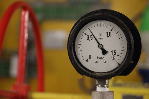 istock measuring the pressure on the mechanical manometer 1025885324