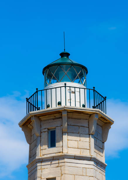 istock Lighthouse near Gythio in the afternoon against a blue sky 1025907092
