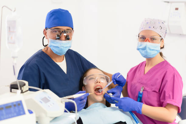 istock Dentist Team During Implant Procedure 1025907330
