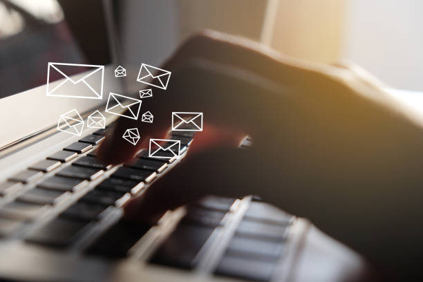 istock Close up of woman hand using laptop with email icon for sending email concept.selective focus. 1025914820