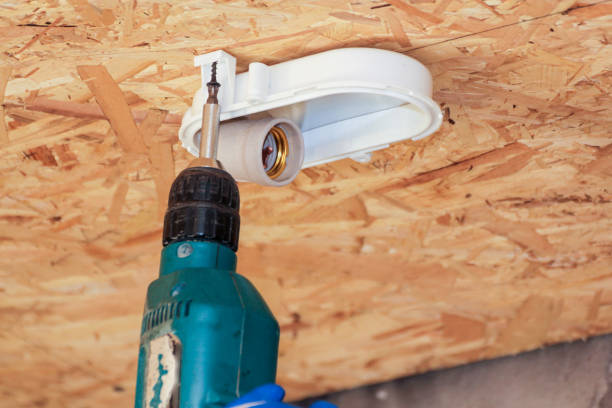 istock Installation of electric lamps. 1025915830