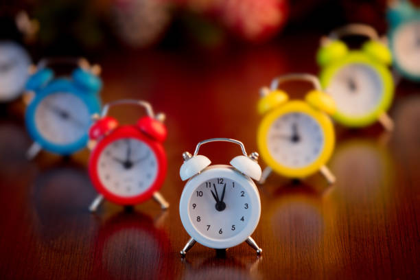 istock group of color alarm clocks 1025925238