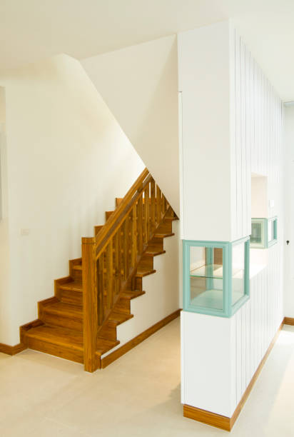 istock House interior with modern wooden staircase 1025933106