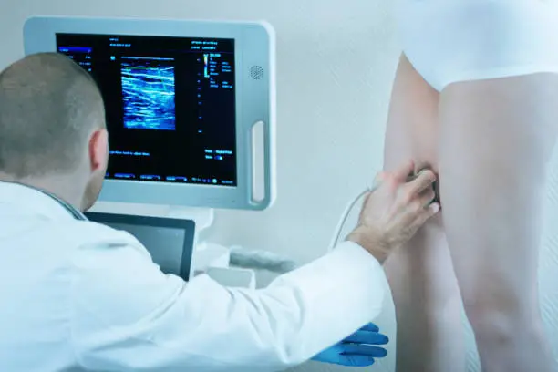 Doctor doing ultrasound scan