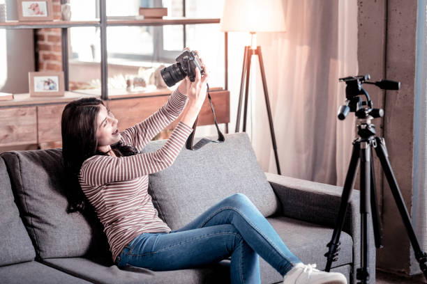 istock Inspired woman having fun with her cam 1025936994