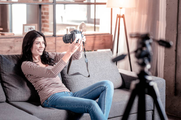 istock Happy woman having fun with her cam 1025937062
