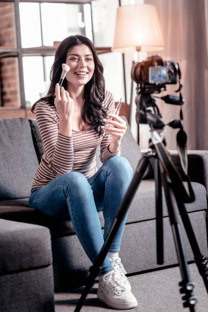 istock Cheerful blogger making a video for her followers 1025937198