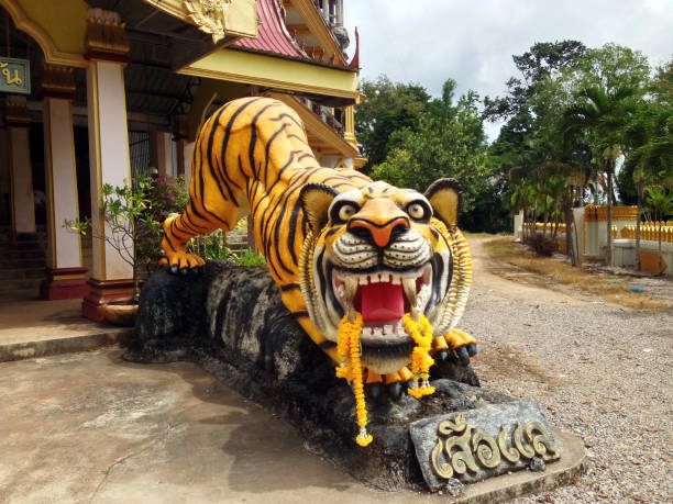 statues at Tiger Cave Temple in Krabi, Thailand temple decoration wat tham sua stock pictures, royalty-free photos & images