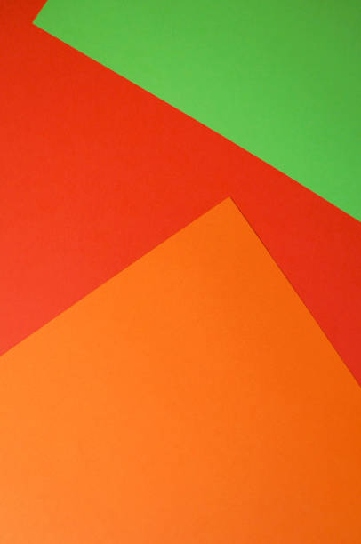 istock Background of bright paper sheets. Green, red and orange. 1025941962