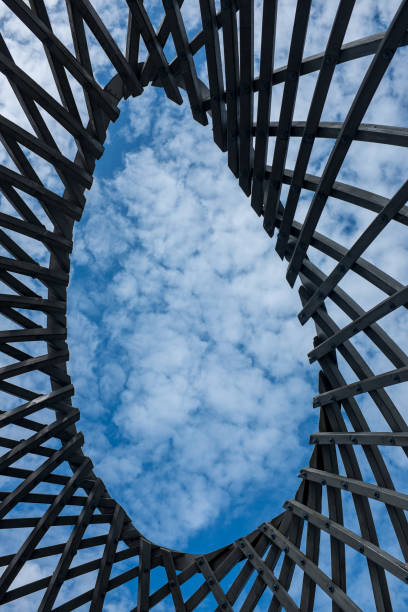 istock Sky with fantastic clouds from modern design wooden lines 1025944042