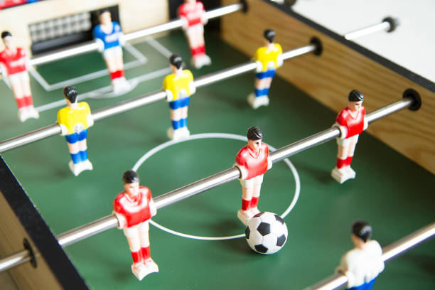 istock Close up image of table socker game and players 1025945142
