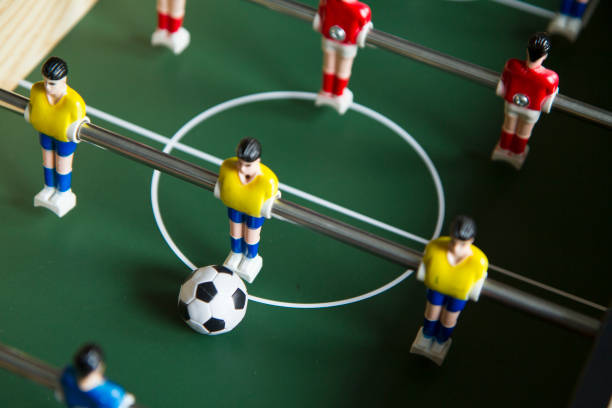 istock Close up image of table socker game and players 1025945160