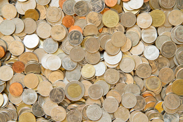 istock Pile of Thai coins background 1025945268