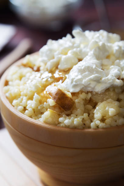 istock Millet porridge with pear and cottage cheese macro 1025945836