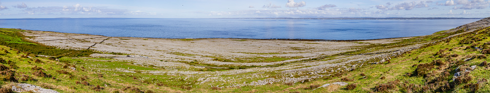 Panorama of Fanore beach in Burren mountain with Galway bay in background, Fanore, Clare, Ireland