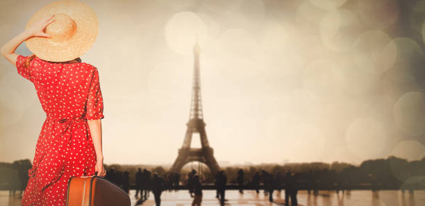 istock girl with suitcase in Paris 1025954428