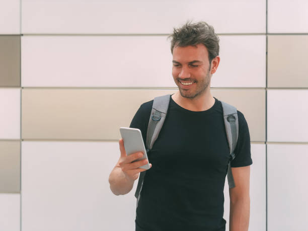 istock Happy man with mobile phone 1025954766