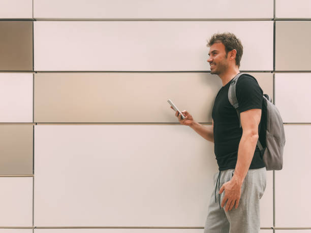 istock Happy man with mobile phone 1025954804
