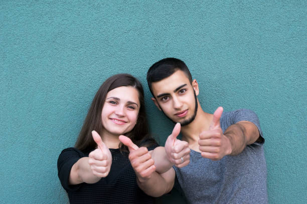 istock Two happy people outdoors 1025960020
