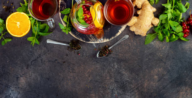 istock Top view of tea set on dark background 1025960496