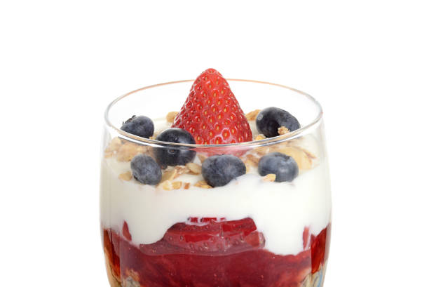 istock closeup isolated strawberry and blueberry parfait 1025963078