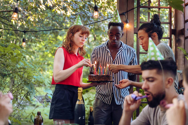 istock Multi-ethnic group of people celebrating birthday 1025963548