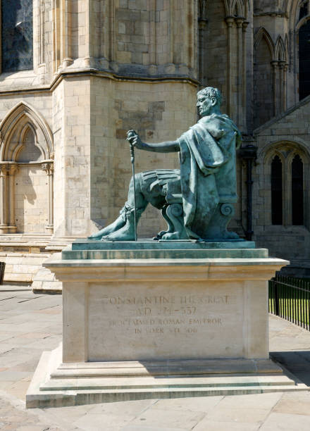 Bronze statue of Roman Emperor Constantine the Great YORK, YORKSHIRE, UK: JULY 13, 2003: Bronze statue of Roman Emperor Constantine the Great outside York Minster cathedral statue of emperor constantine york minster stock pictures, royalty-free photos & images