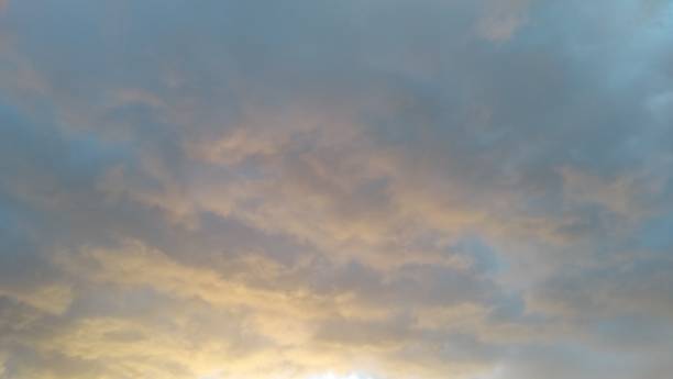 istock Superb orange pink gray blue cloudscape sunbeam 1025984242