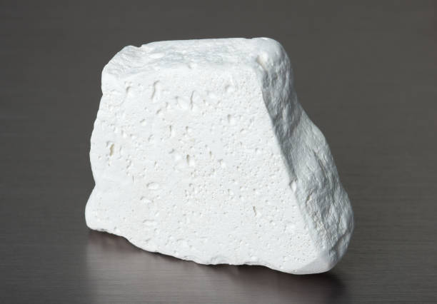 specimen of mineral kaolinite (kaolin) on gray background - 2127 imagens e fotografias de stock