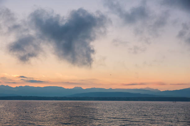 istock Heart Shaped Clouds Formation over Leman Lake and Iconic Mont-Blanc  Mountains Range 1025987566
