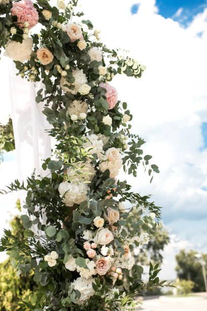 istock wedding chuppa  decorated with flowers 1025993562