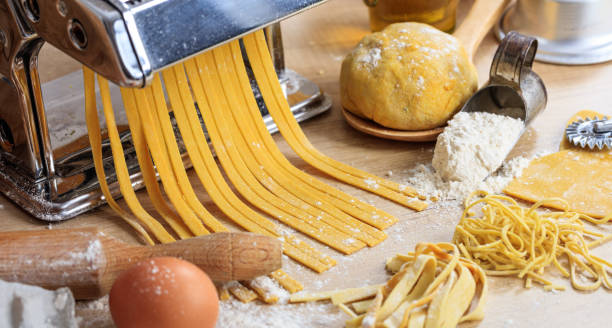 istock Fresh tagliatelle pasta homemade preparation 1025998126
