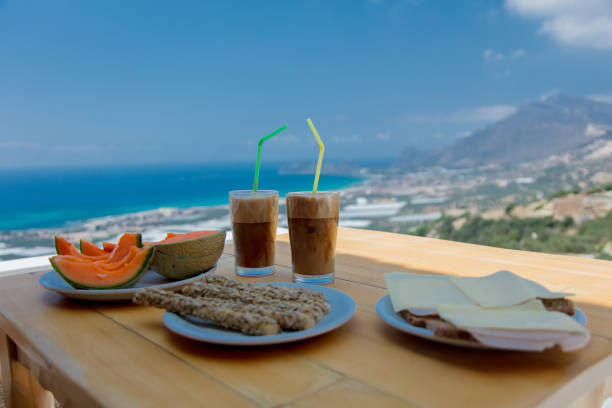 istock Cold cappuccino and bread with cheese as vacation dinner 1026006518