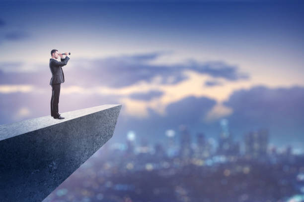 istock business vision concept with businessman on cliff 1026006960