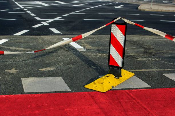 istock Road work on city streets, road closed for traffic 1026011548