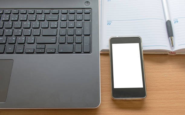 istock Business Working table with the laptop smartphone. 1026012772