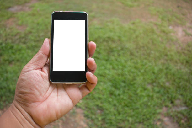 istock Soft focus of hand using mobile smart phone. 1026012924