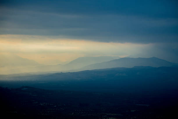 Sunset over mountains and garden in Heraklion region, Crete, Greece