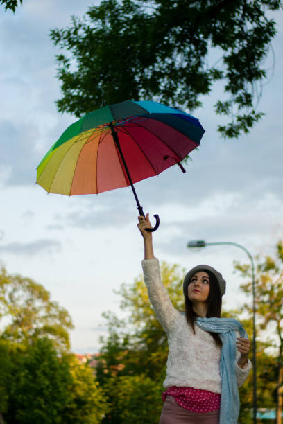 istock Happy woman under the rain 1026040196