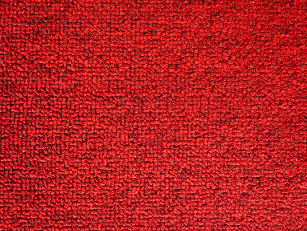 istock Elegance red color carpet texture background 1026050880