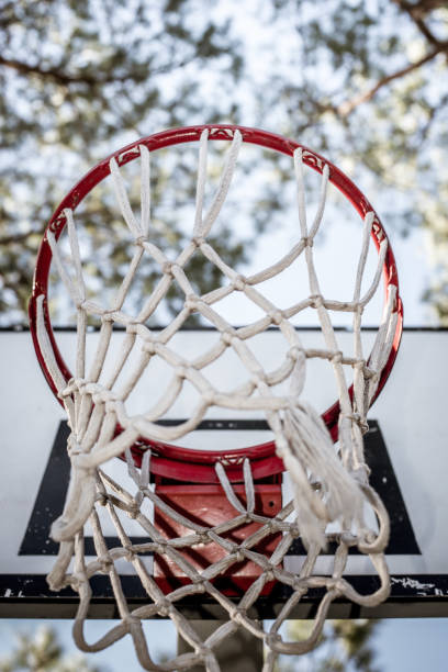 istock Low angle view basketball hoop 1026066594