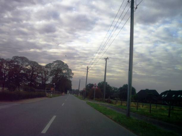 istock Country road summer drive 1026069496