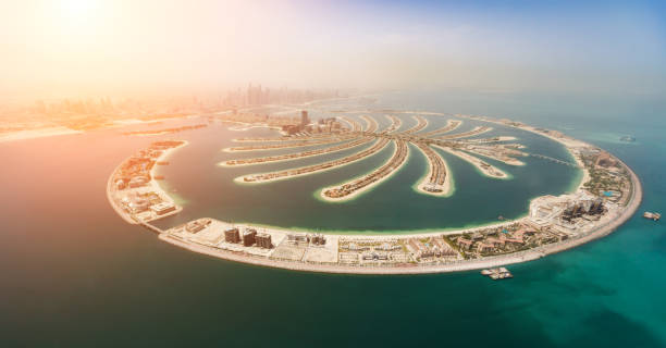 Aerial view of artificial palm island in Dubai. Aerial view of artificial palm island in Dubai. Panoramic view. jumeirah stock pictures, royalty-free photos & images