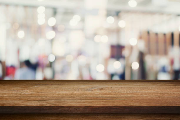 istock Empty wooden table and abstract blurred image background display montage for product. 1026077878