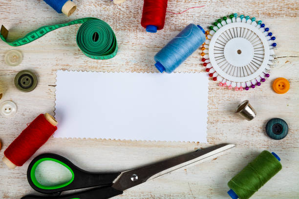 istock Sewing accessories and paper 1026078188