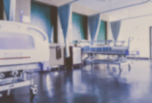 Empty gurney at a hospital room - healthcare and medicine concepts