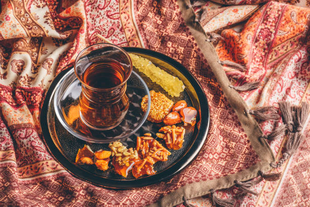 Tea in armudu with oriental delights and crystal sugar