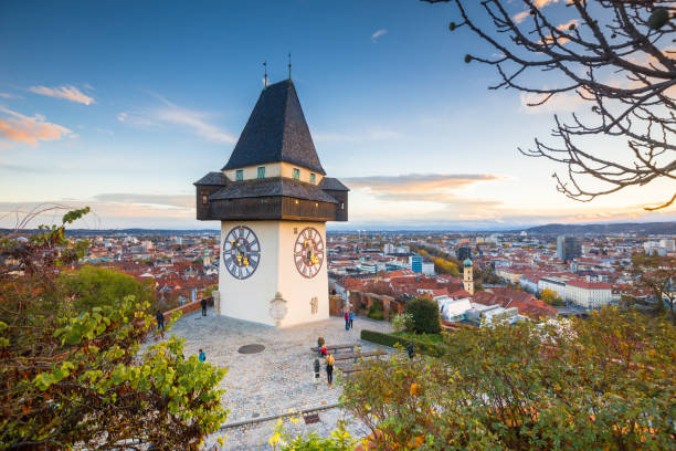 istock Graz clock tower at sunset, Graz, Styria, Austria 1026135616
