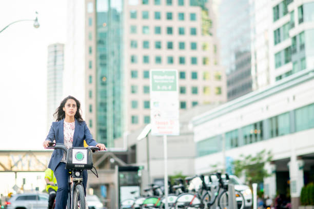istock Woman riding a bike 1026139498